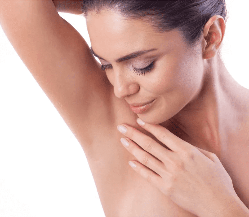 Woman touching her hairless armpit